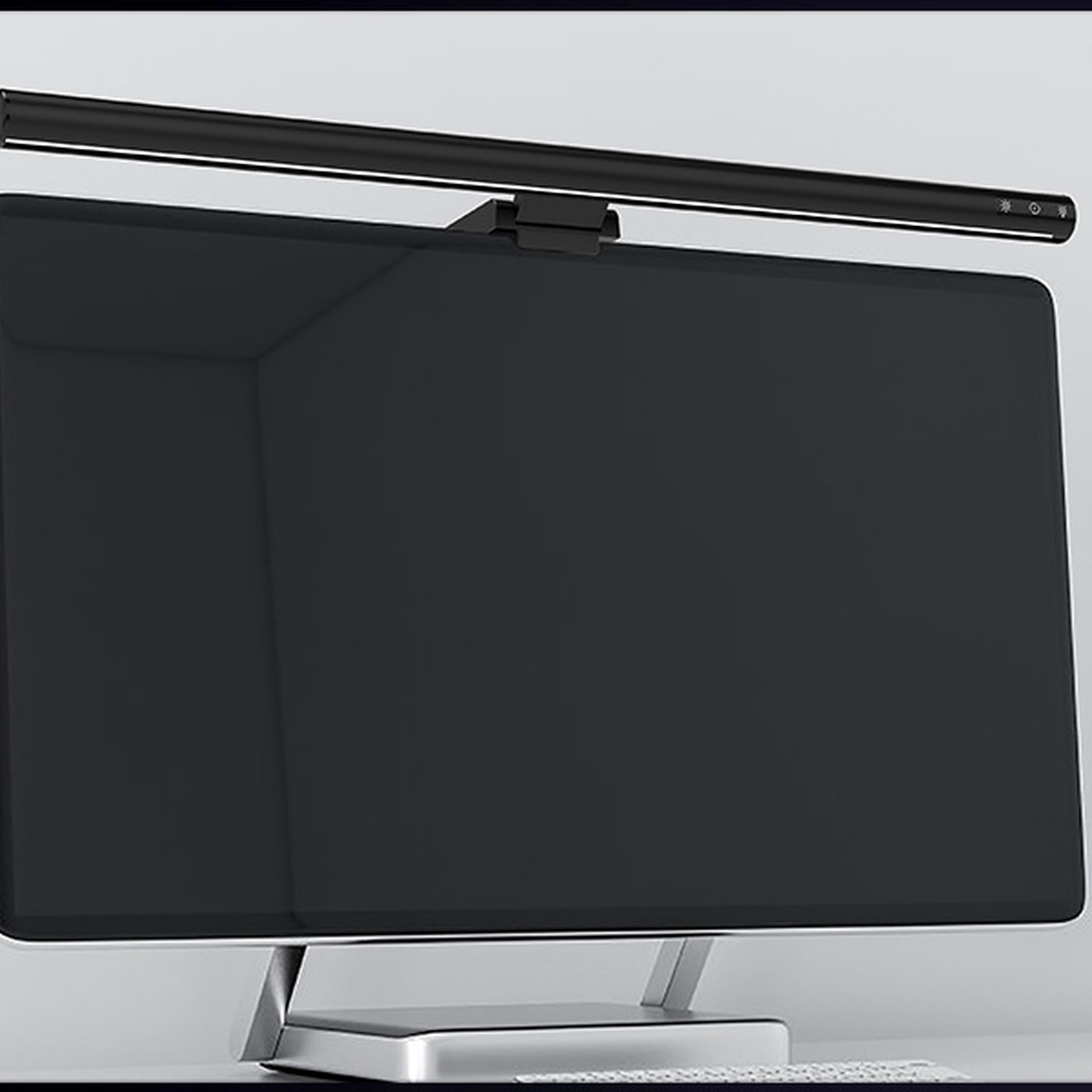 Black LumenBar monitor light mounted above a desktop monitor